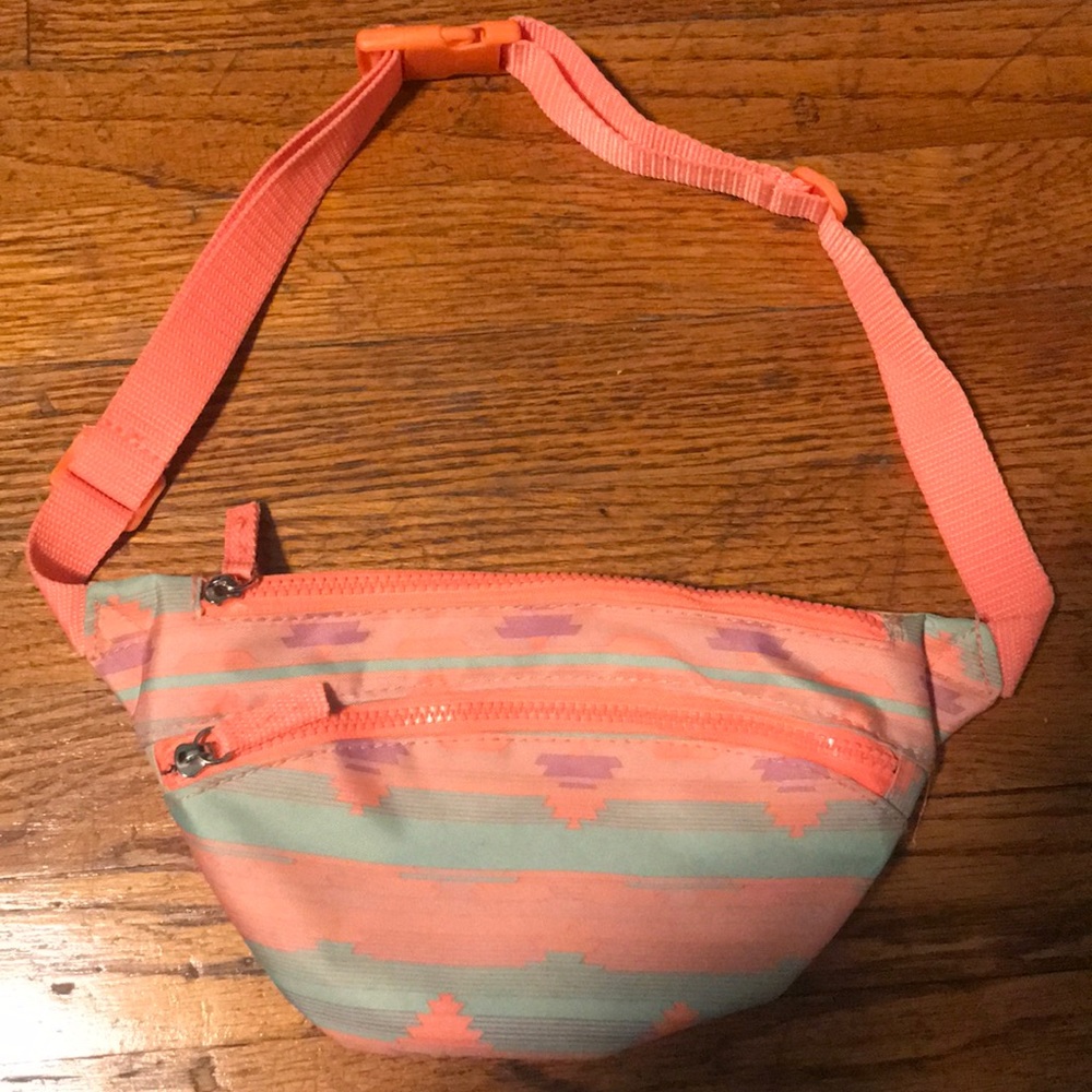 A pink and baby blue fanny pack